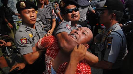 Violence by police against workers