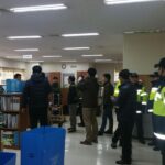 Полиция обыскивает офисы KMWU в Корее.