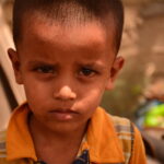 Six-year-old Muhammad Suhail is being raised by his poverty-stricken grandparents after his father perished in the factory fire.