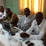 Discussing tactics on how to STOP Precarious Work in Western Africa. 