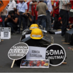 Mock coffins and helmets during a demonstration in Istanbul, May 2014, blaming the government for the Soma disaster. Photo credit REUTERS