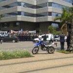 Maghreb Steel workers at a sit in protest outside a bank