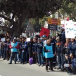 Maghreb Steel workers at a sit in protest outside a bank