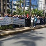 Maghreb Steel workers at a sit in protest outside a bank