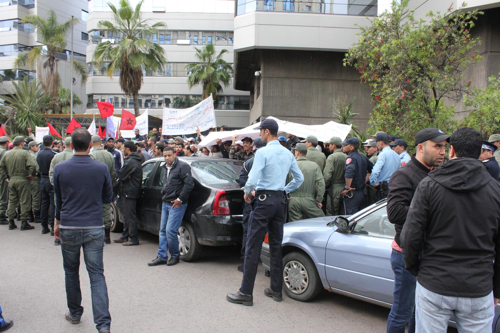 Maghreb Steel workers at a sit in protest outside a bank