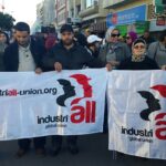 Представители IndustriALL и его членских профсоюзов на митинге 12 марта.