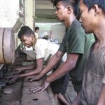 Young children often lie about their age to be able to work  - photo: David Browne