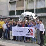 STMicroelectronics union representatives in front of the International Solidarity sculpture at IndustriALL's Geneva headquarters