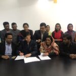 The signing of the collective agreement