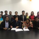 The signing of the collective agreement
