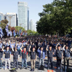 Thousands of local union leaders and grassroots members demonstrate in front of Korea’s National Assembly on May 24 in Seoul calling for enactment of “Chaebol Reform Bill,” “Special Act on Developing the Manufacturing Base,” and an “Ban Union Busting Bill.” After a moment of silence to remember those who died in the fight for workers’ rights and democratic rights, the workers sang “Marching Song of the People” to open the demonstration. Photo: SHIN, Dong-Jun