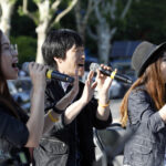 Workers’ culture group, “Tinged in Song,” sings at the 24 May demonstration. Photo: SHIN, Dong-Jun