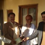 Bashir Mehmoodani, President, Shipbreaking Mazdoor Union handing over compensation cheques to the deceased workers’ families