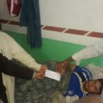 Bashir Mehmoodani, President, Shipbreaking Mazdoor Union handing over compensation cheques to the deceased workers’ families