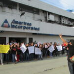 Trabajadores/as frente a las instalaciones de Amertron el 25 de septiembre, protestando las arbitrariedades de la empresa