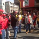 NUM President, Piet Matosa leads a march to fight against retrenchments in the mining industry in Johannesburg on 5 August