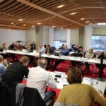 Participants à la réunion de General Electric
