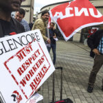 Protesters standing outside Glencore AGM