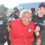 Полиция задерживает участников марша 26 декабря (фото Birlesik Metal)