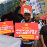 IndustriALL и его членские профсоюзы из 12 стран мира протестуют у здания, в котором проходит собрание акционеров Shell в Гааге, Нидерланды, 22 мая.
