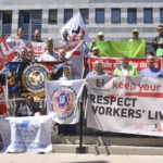 Unions protest outside the meeting