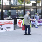 Union activists gave out flyers to shareholders