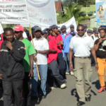 ﻿FISEMA Fort Dauphin marching on May Day with fellow trade unions in Madagascar.