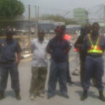 At the gate of the platinum mine