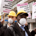 Activists protest against Rio Tinto and Anglo American at their Annual General Meeting, April 2013. Amy Scaife/ London Mining Network