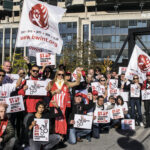 Union activists protest precarious work in Geneva